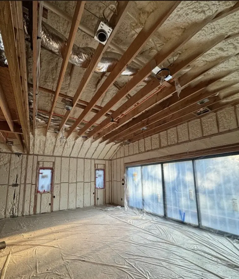 Interior walls and ceiling insulated with spray foam during new construction in Port Allen